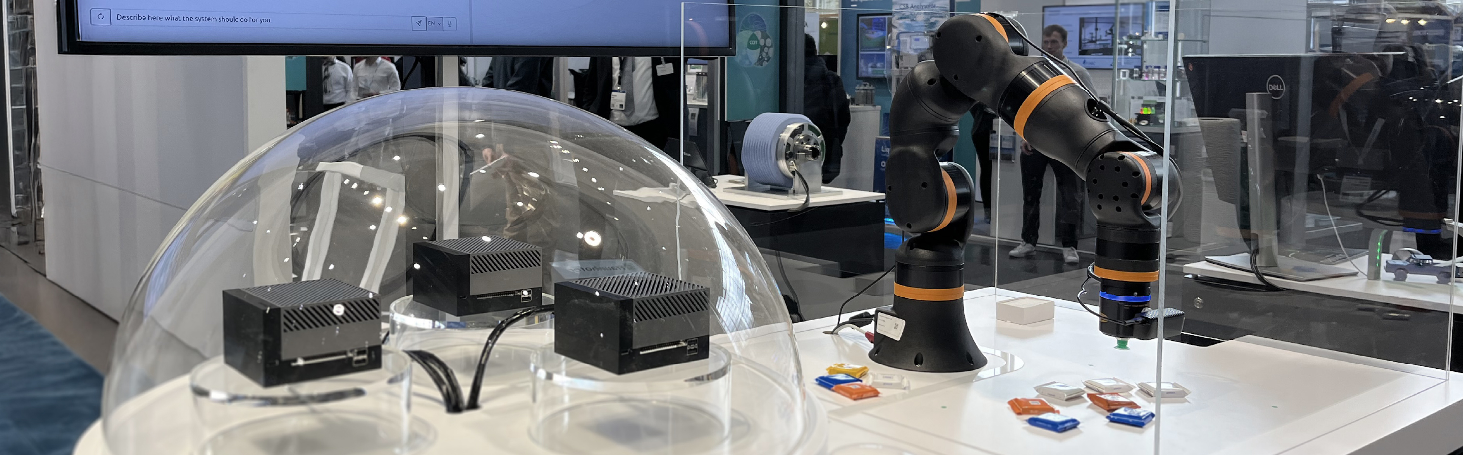 RobotLLM demonstrator at a Fraunhofer trade fair exhibition space
